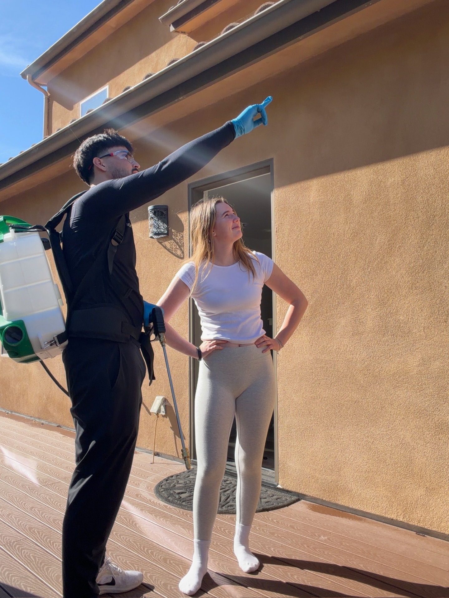 Eddie consulting with a homeowner about pest control